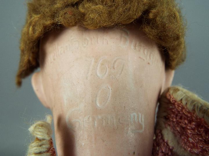 A Schoenau & Hoffmeister character doll with bisque head with sleeping brown eyes, composition body, - Image 3 of 3