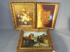 Three framed oils on canvas, two still life studies of flowers and a village scene,
