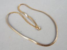 A 9ct gold necklace, 47 cm (l), approximately 8.4 grams all in.