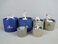 A collection of Swarovski crystal figures, animals and similar all boxed.