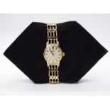 A lady's 9ct gold Omega wristwatch, yellow gold case and bracelet, approximately 18 grams all in.