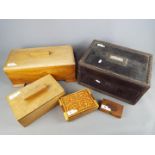 A collection of trinket boxes, storage boxes and similar.