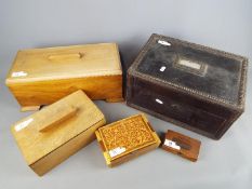 A collection of trinket boxes, storage boxes and similar.