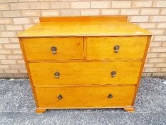 A chest of two over two drawers measuring approximately 85 cm x 99 cm x 55 cm.