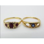 A hallmarked 18ct gold trilogy ring (A/F, two stones missing), size N+½,