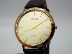 A gentleman's 9ct gold cased Accurist wristwatch, stamped .