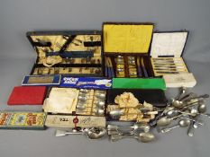 A quantity of cased and loose flatware, predominantly plated.