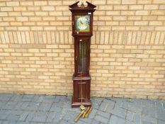 A modern longcase clock with three weights and pendulum,