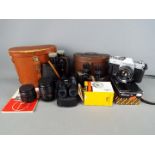 A vintage Mamiya / Sekor 500TL, two additional Carl Zeiss Jena lenses,