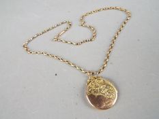 A hallmarked 9ct gold locket pendant on belcher chain (43 cm length) stamped 9ct,