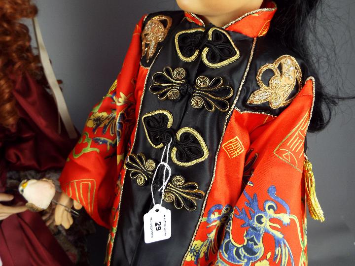 Dolls - one dressed in traditional Chinese silk costume and another, - Image 5 of 7