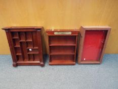 A mixed lot of three wall or table mounted display cases for collectables.