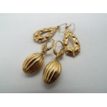 Two pairs of hallmarked 9ct yellow gold earrings, approximately 7.25 grams all in.