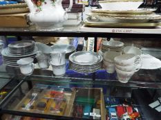 A quantity of dinner and tea ware by Crown Ming and Royal Stuart.