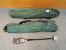 A Hi Gear folding camping chair, one other similar and a Featherwate shooting stick.