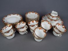 A quantity of vintage Tuscan Chine tea wares in the Imari palette comprising 12 trios,