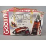 A boxed Goblin Aztec cylinder vacuum cleaner.