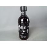 A bottle of Bells Red Devil 70 cl 40% ABV