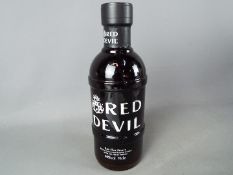 A bottle of Bells Red Devil 70 cl 40% ABV