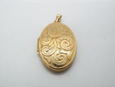 A 9ct gold pendant locket, stamped 375, approximately 4.6 grams all in.