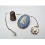 Lot to include a Wedgwood Jasperware and white metal oval brooch,