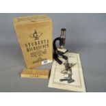 A vintage Signalling Equipment Ltd 'Students Microscope No. 2' contained in original box.