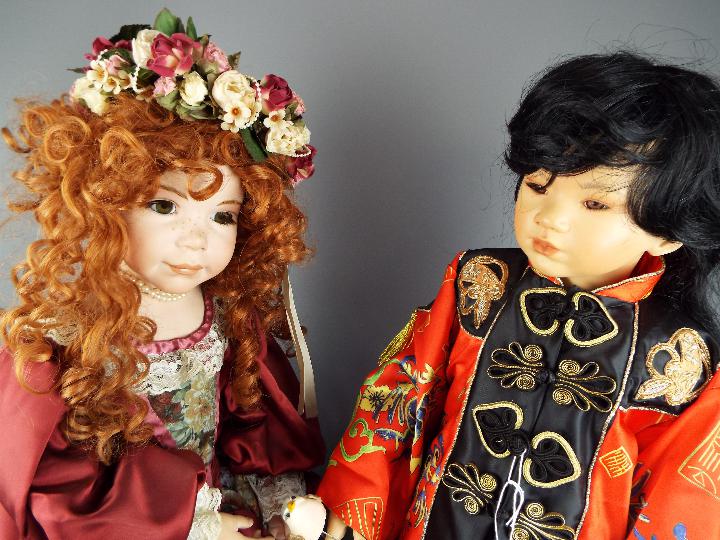 Dolls - one dressed in traditional Chinese silk costume and another, - Image 2 of 7