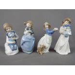 Nao - Four Nao figurines depicting young girls, largest approximately 20.5 cm (h).