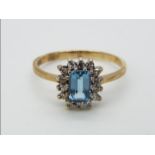 A hallmarked 9ct gold cluster ring, size O+½, approximately 2.1 grams all in.