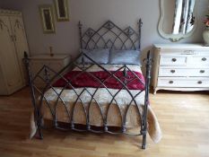 A modern metal framed double bed as illustrated (mattress and bedding not included)