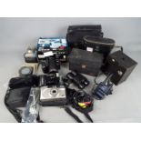 Photography - A quantity of cameras and photographic equipment.