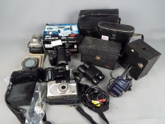 Photography - A quantity of cameras and photographic equipment.