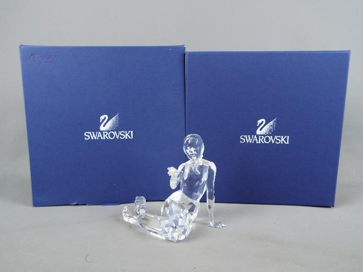 Swarovski - A Swarovski Crystal figurine depicting a mermaid holding a pearl,