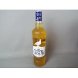 A bottle of Snow Grouse 70 cl 40% ABV