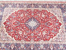 A good quality rug measuring approximately 120 cm 180 cm.