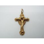 A hallmarked 9ct gold crucifix pendant, approximately 5.9 grams all in.