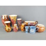 A collection of Oldcourt Ware lustre ceramics and two pieces of Wedgwood Jasperware.
