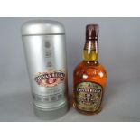 A bottle of Chivas Regal 12 year old 70 cl 40% ABV in presentation tin