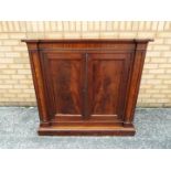 A William IV large twin door cupboard measuring approximately 102 cm x 106 cm x 50 cm.
