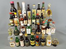 30 miniature bottles of whisky, gin,