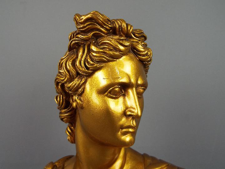 A plaster bust of Apollo finished in a gold colourway, approximately 32 cm (h). - Image 2 of 2