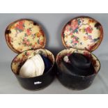 Two vintage hat boxes containing a quantity of lady's hats.