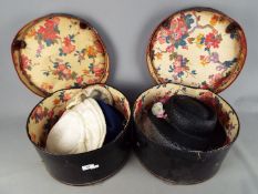 Two vintage hat boxes containing a quantity of lady's hats.