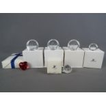 Swarovski - A collection of Swarovski Crystal paperweights, all boxed.