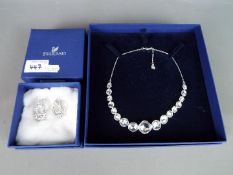 Swarovski - A boxed Swarovski 'Mineral Collar' necklace and a boxed pair of Swarovski crystal