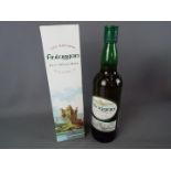 A bottle of Finlaggan Islay Single Malt 70 cl 40% ABV