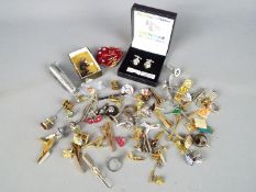 Lot to include cufflinks, pin badges, silver hallmarked gentleman's ring, size W+½ and similar.