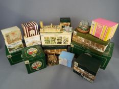 A collection of Lilliput Lane and similar models, predominantly boxed,
