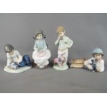 Nao - Four Nao figurines depicting children, largest approximately 18.5 cm (h).