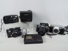 Photography - A quantity of cameras to include a Yashica EZ-Matic, a Pacer 35EC,